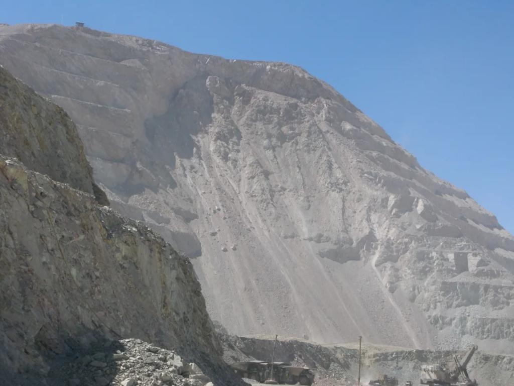 Large open-pit quarry rock face landscape